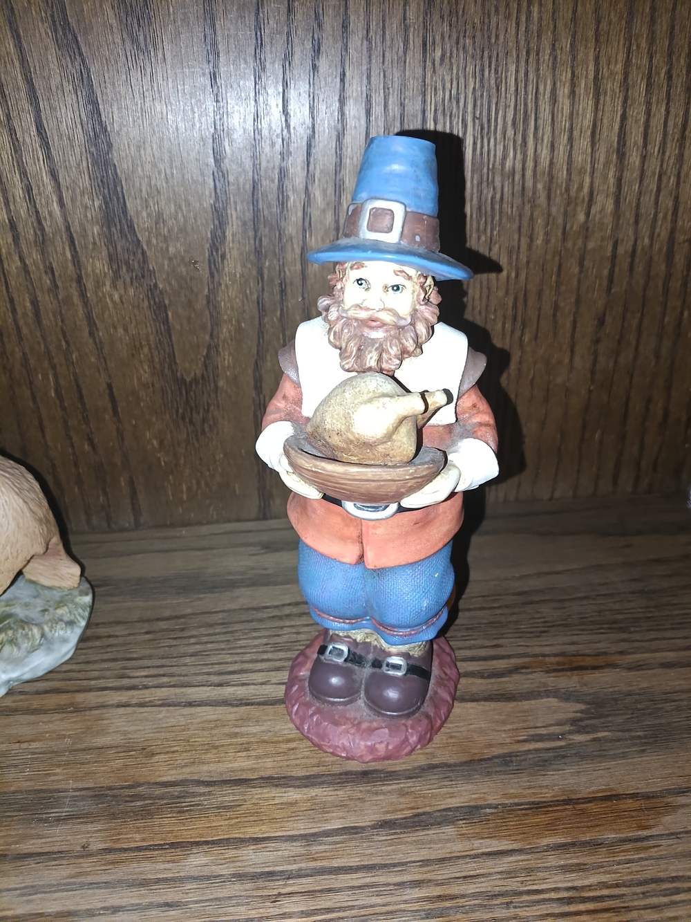 Source Unknown Blue Hat Pilgrim Figurine with Brown and Orange Outfit